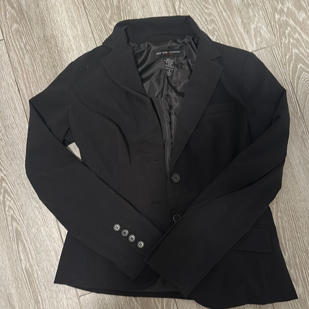 Black blazer with small shoulder pads